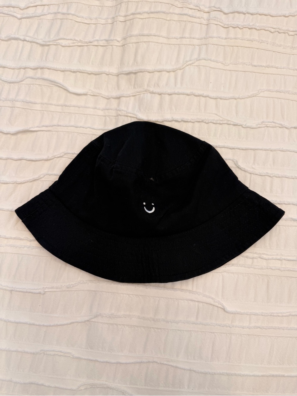 Black Bucket Hat with Smiley Accent